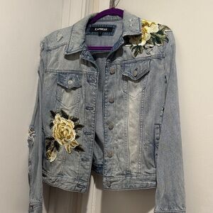 Express Women's Light Blue Denim Jacket with Yellow Floral Accents on